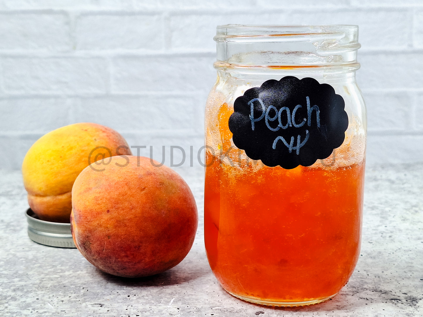 Semi-Exclusive Peach Jam on Concrete