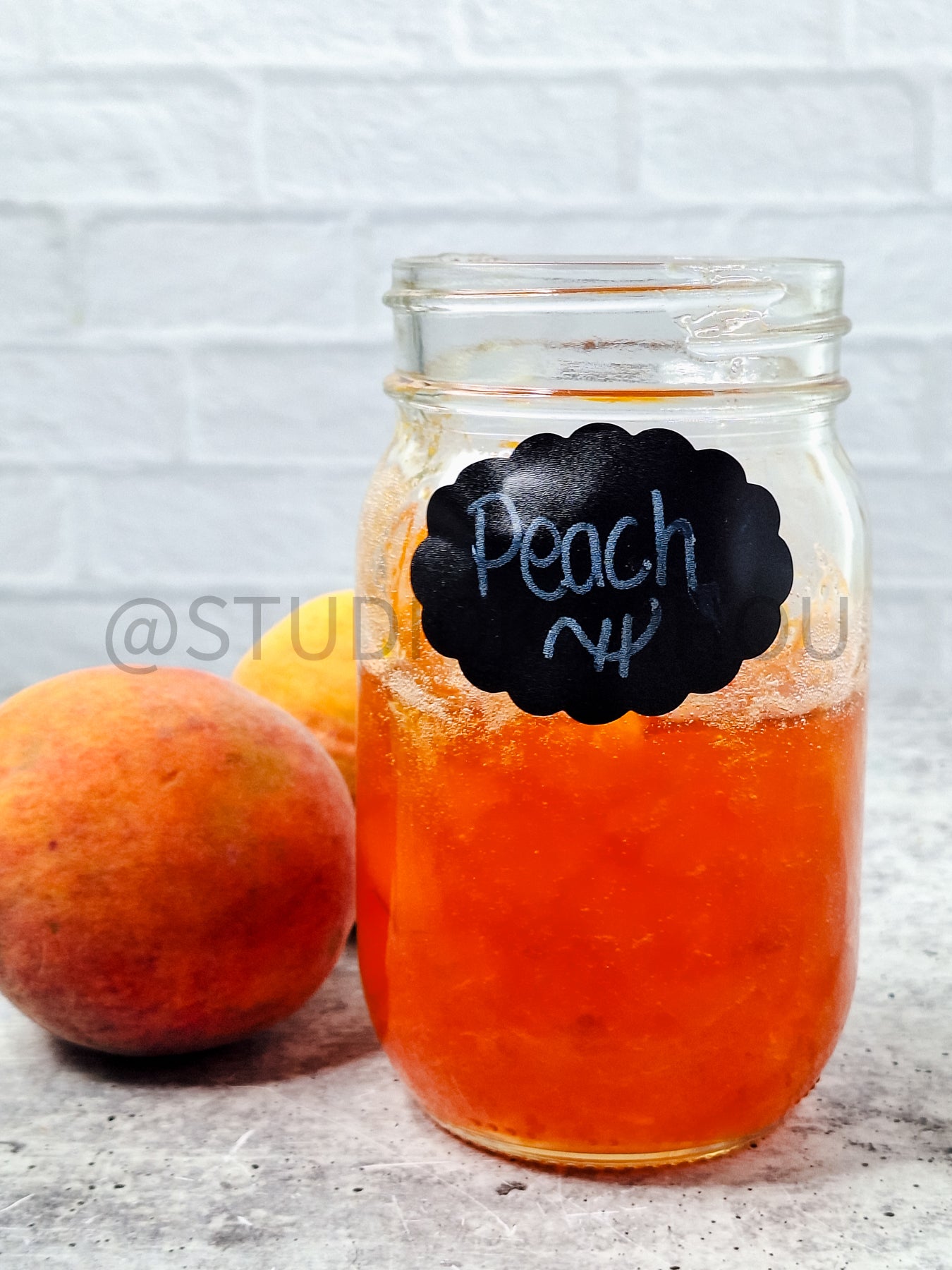 Semi-Exclusive Peach Jam on Concrete