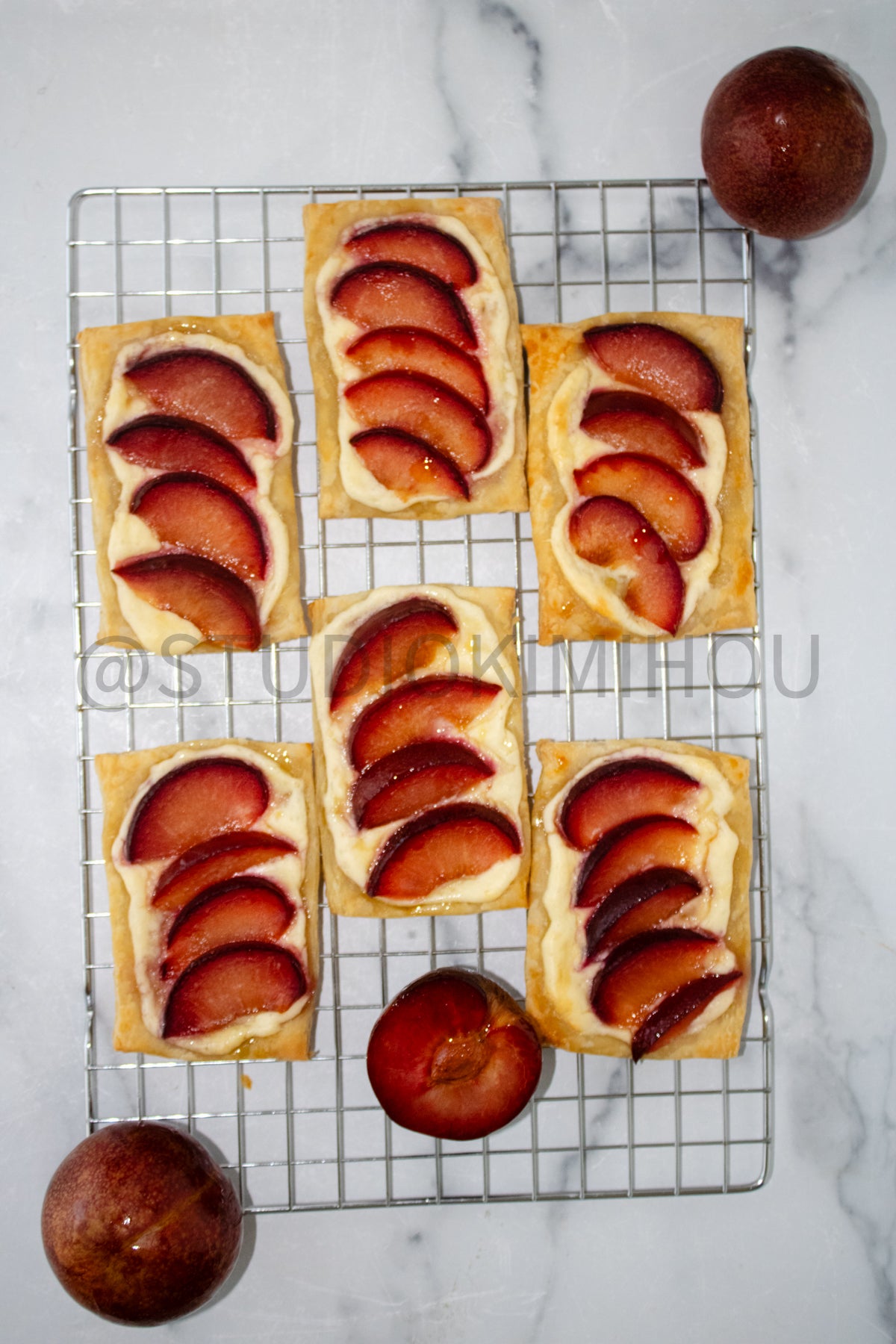 Semi-Exclusive Plum Puff Pastry Tart on Marble
