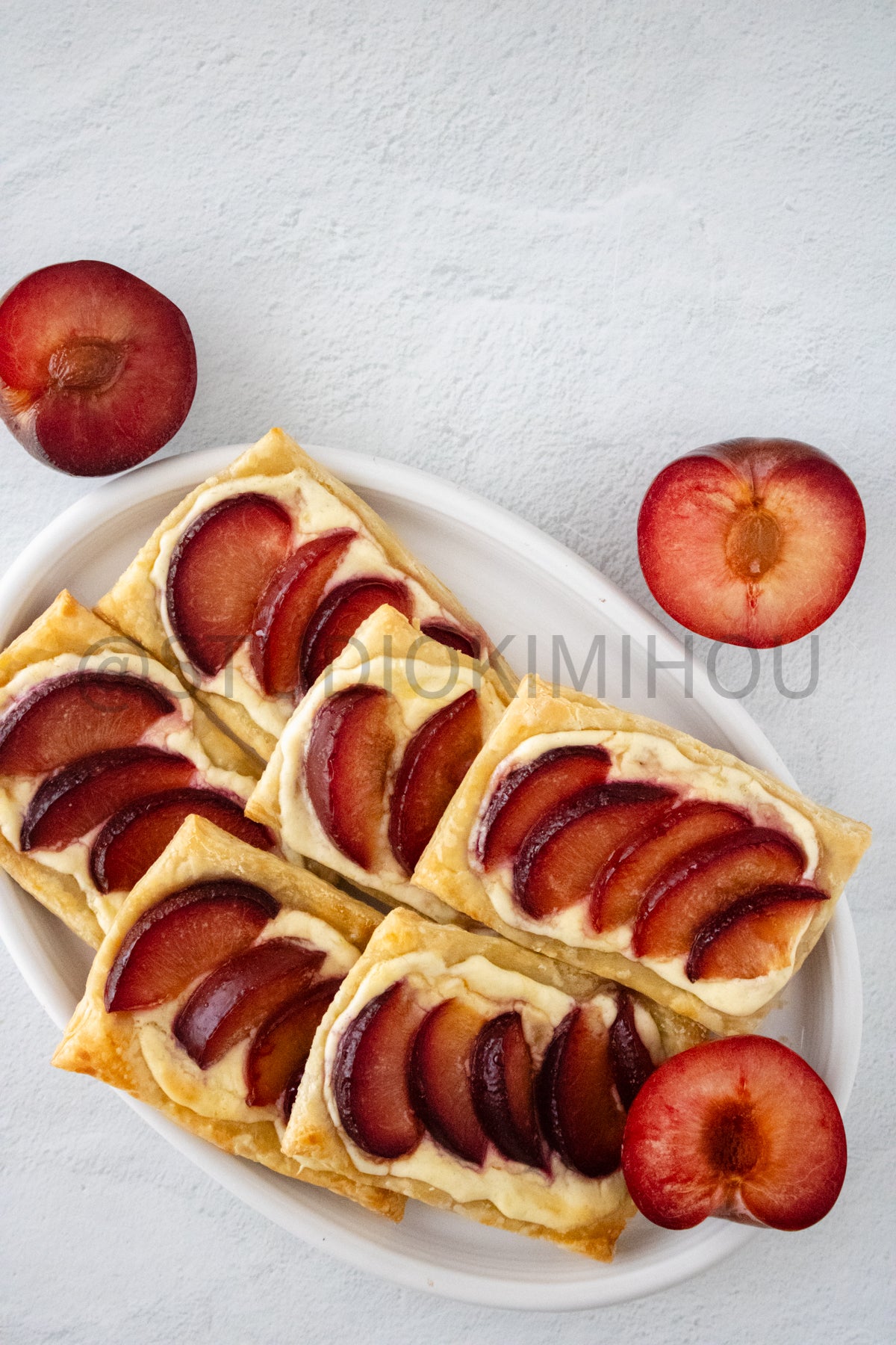 Semi-Exclusive Plum Puff Pastry Tart on Linen