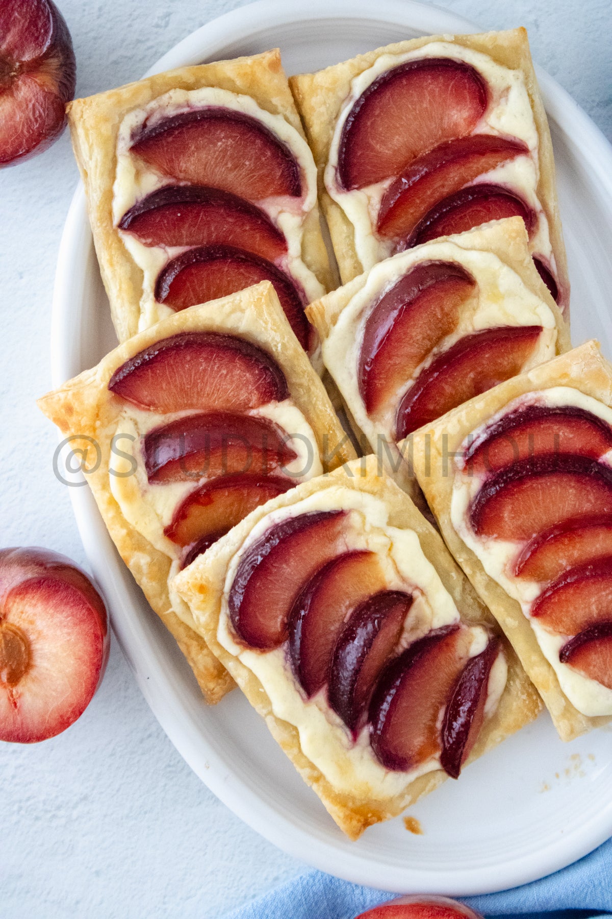 Semi-Exclusive Plum Puff Pastry Tart on Linen