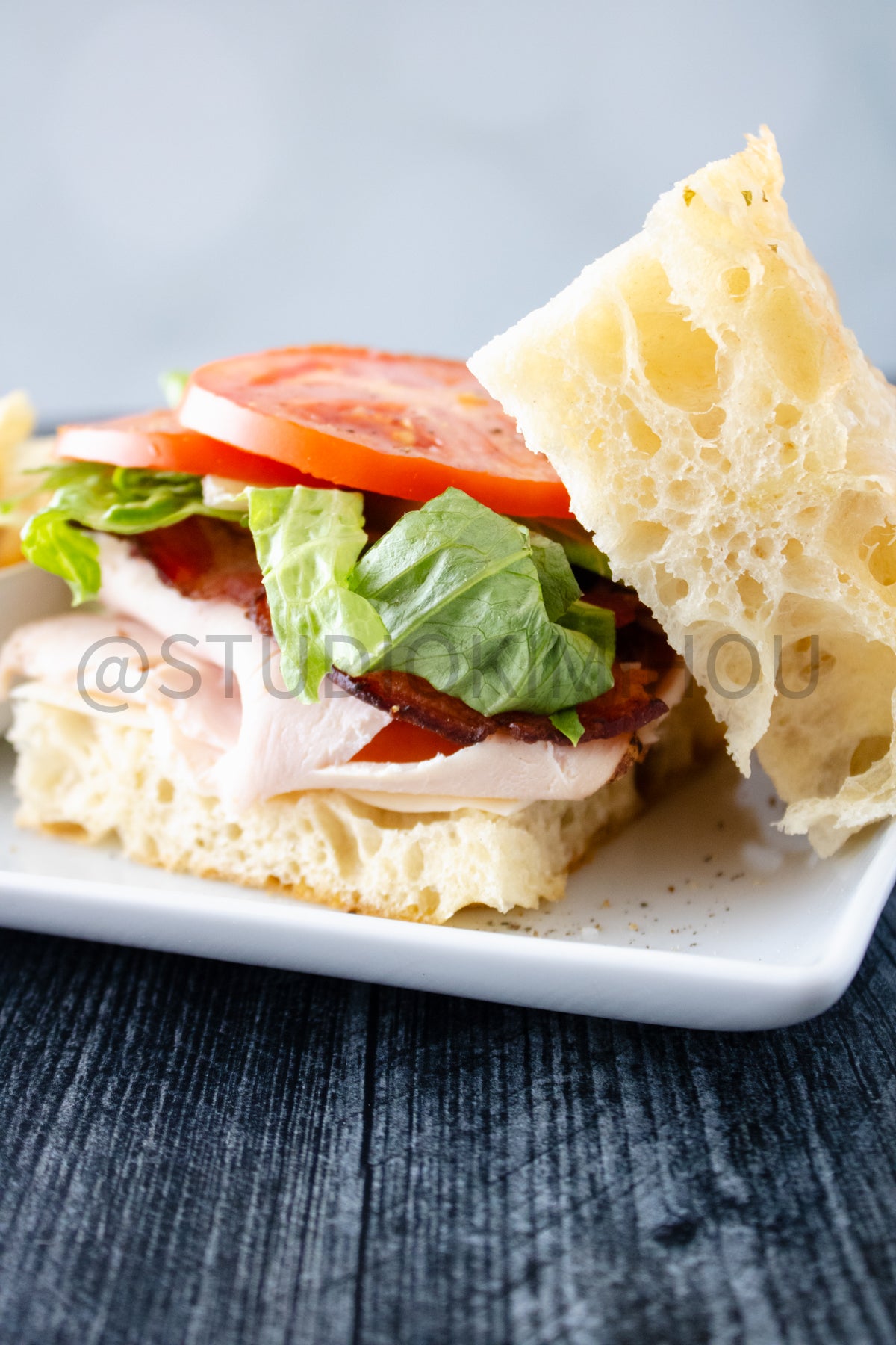 Semi-Exclusive Focaccia Sandwich Bread on Weathered Wood