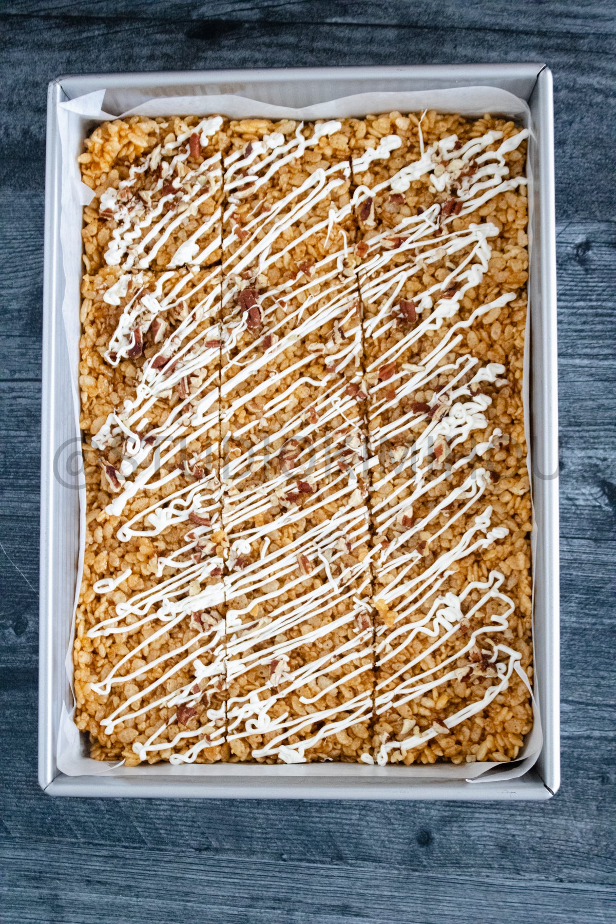 Semi-Exclusive Sweet Potato Rice Krispy Treats on Weathered Wood