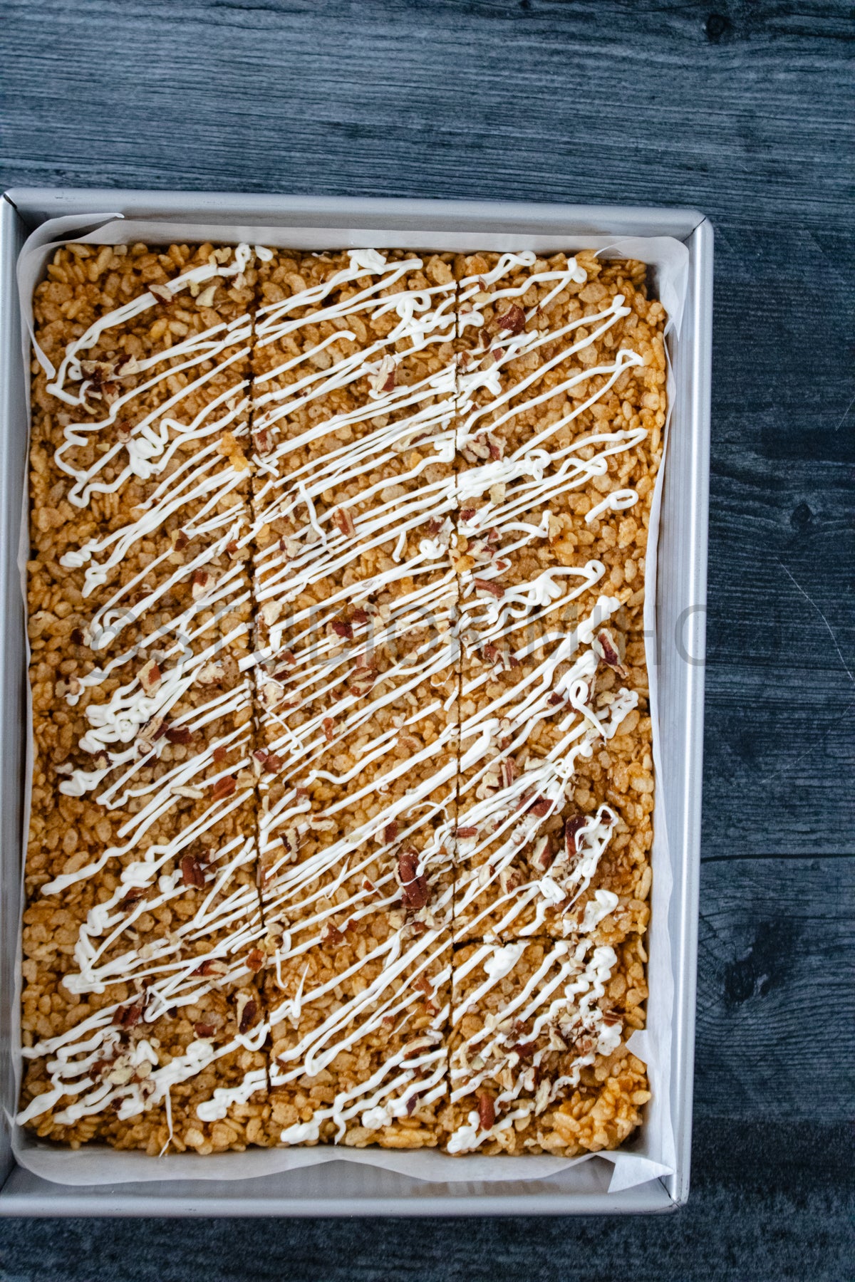 Semi-Exclusive Sweet Potato Rice Krispy Treats on Weathered Wood