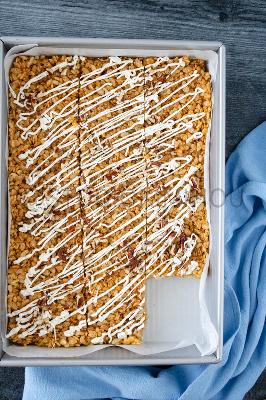 Semi-Exclusive Sweet Potato Rice Krispy Treats on Weathered Wood