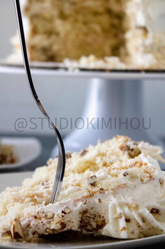 Semi-Exclusive Italian Cream Cake on Weathered Wood