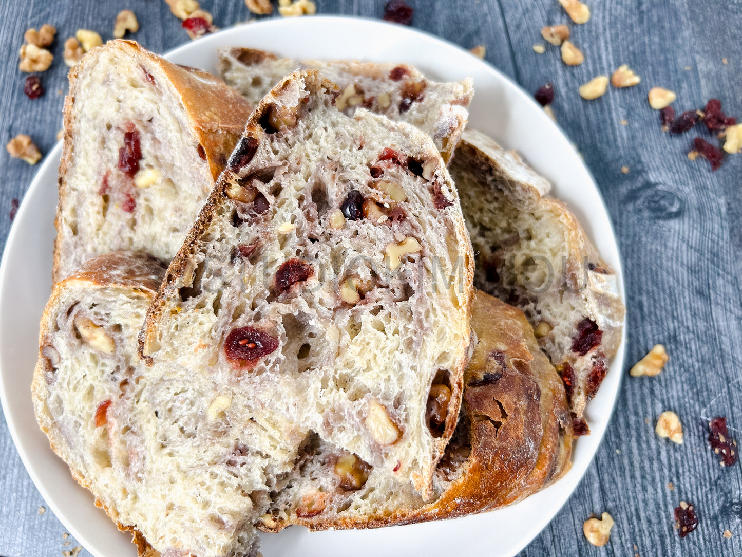 Semi-Exclusive Orange Cranberry Walnut Sourdough on Weathered Wood