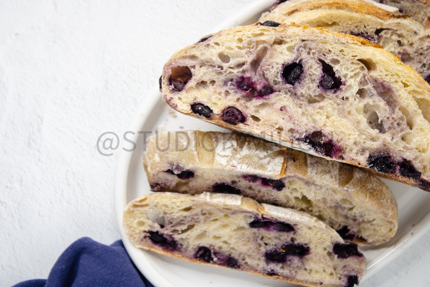 Semi-Exclusive Blueberry Sourdough Bread on Marble