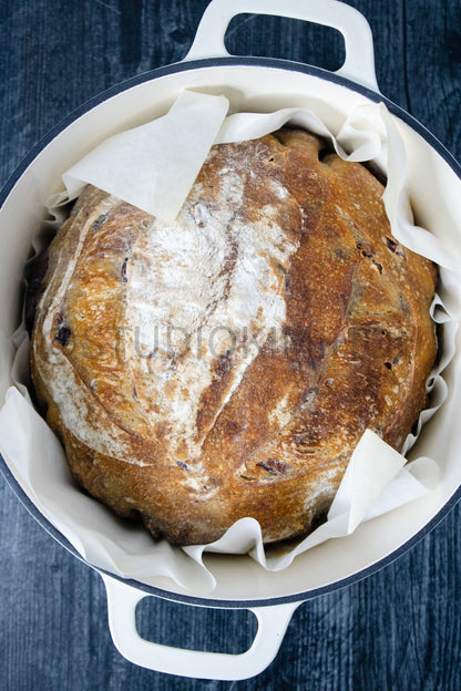 Semi-Exclusive Orange Cranberry Walnut Sourdough on Weathered Wood