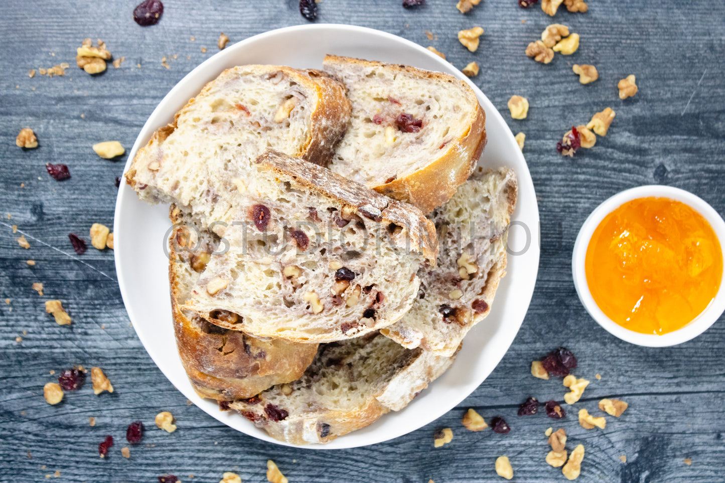 Semi-Exclusive Orange Cranberry Walnut Sourdough on Weathered Wood