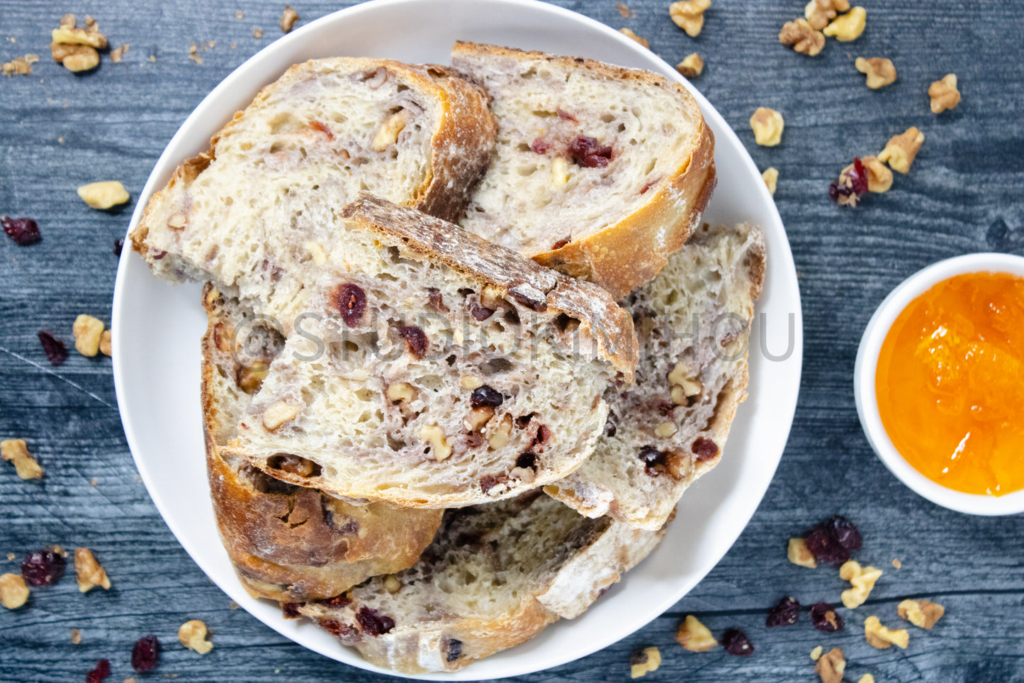 Semi-Exclusive Orange Cranberry Walnut Sourdough on Weathered Wood