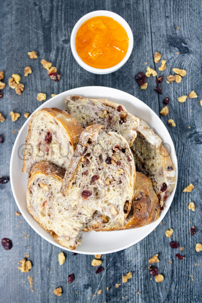 Semi-Exclusive Orange Cranberry Walnut Sourdough on Weathered Wood