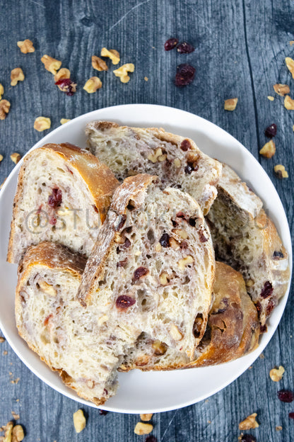 Semi-Exclusive Orange Cranberry Walnut Sourdough on Weathered Wood