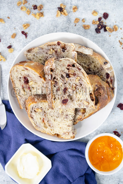 Semi-Exclusive Orange Cranberry Walnut Sourdough on Concrete