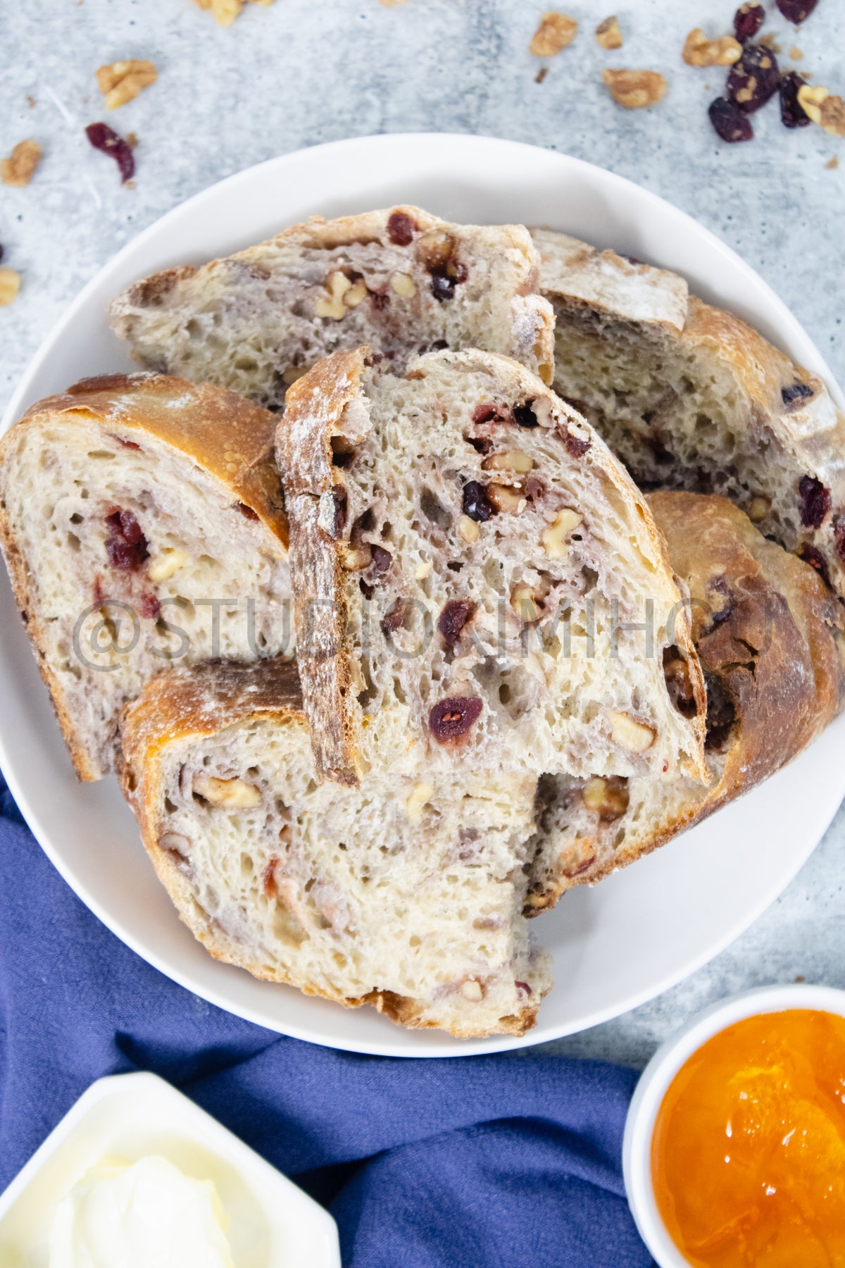 Semi-Exclusive Orange Cranberry Walnut Sourdough on Concrete