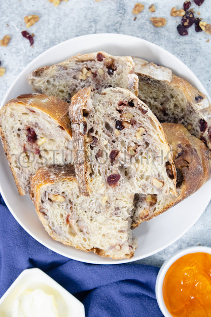 Semi-Exclusive Orange Cranberry Walnut Sourdough on Concrete