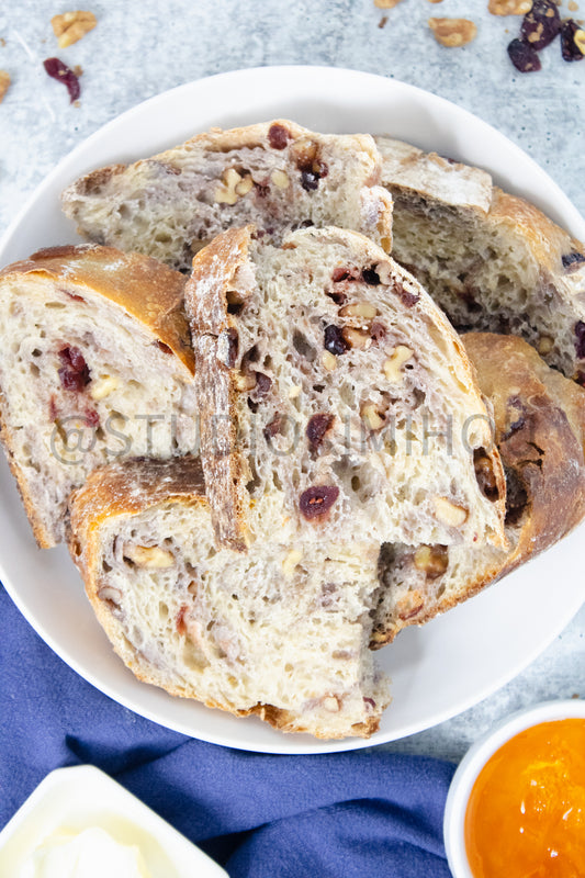 Semi-Exclusive Orange Cranberry Walnut Sourdough on Concrete