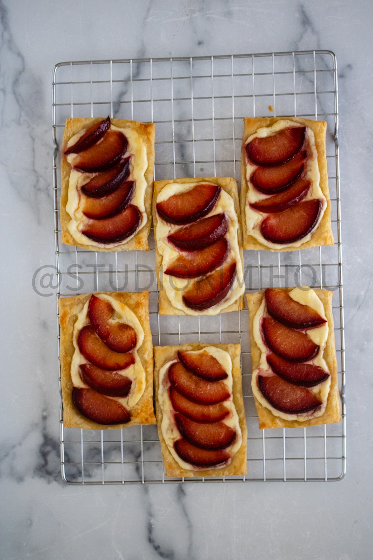 Semi-Exclusive Plum Puff Pastry Tart on Marble