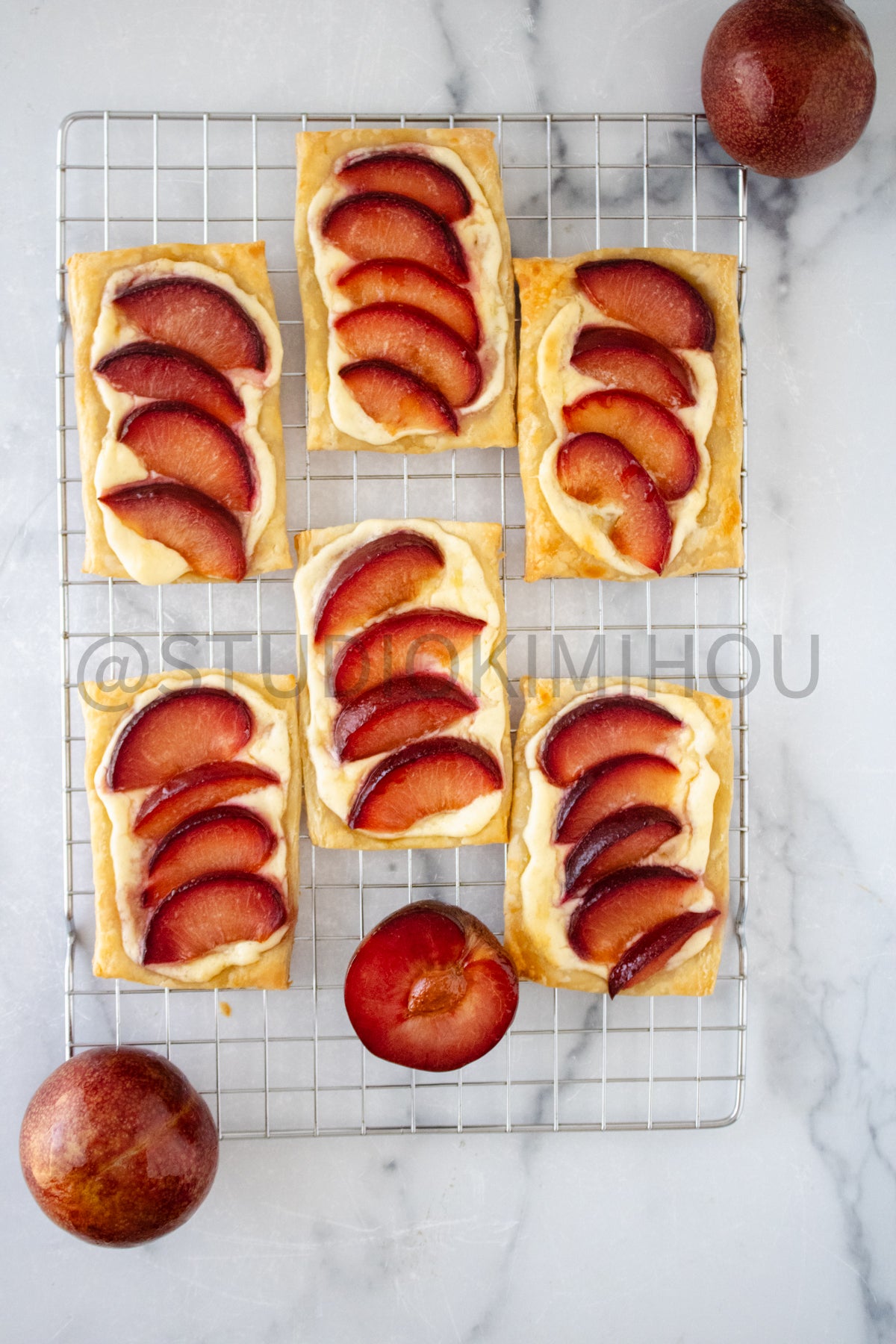 Semi-Exclusive Plum Puff Pastry Tart on Marble