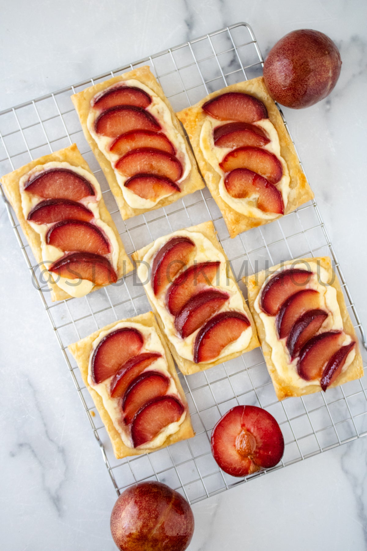 Semi-Exclusive Plum Puff Pastry Tart on Marble