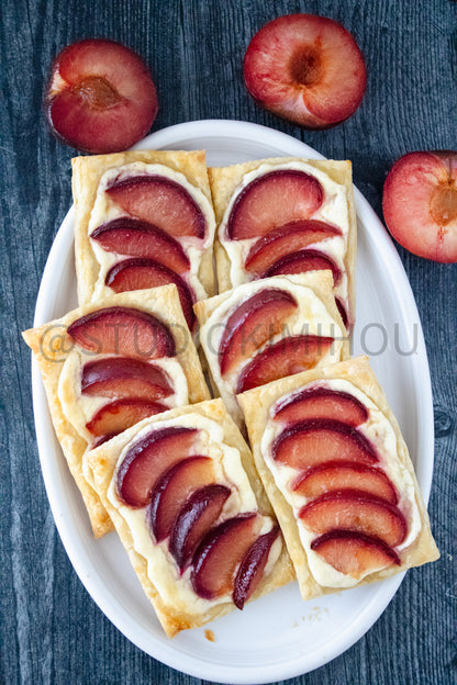 Semi-Exclusive Plum Puff Pastry Tart on Weathered Wood