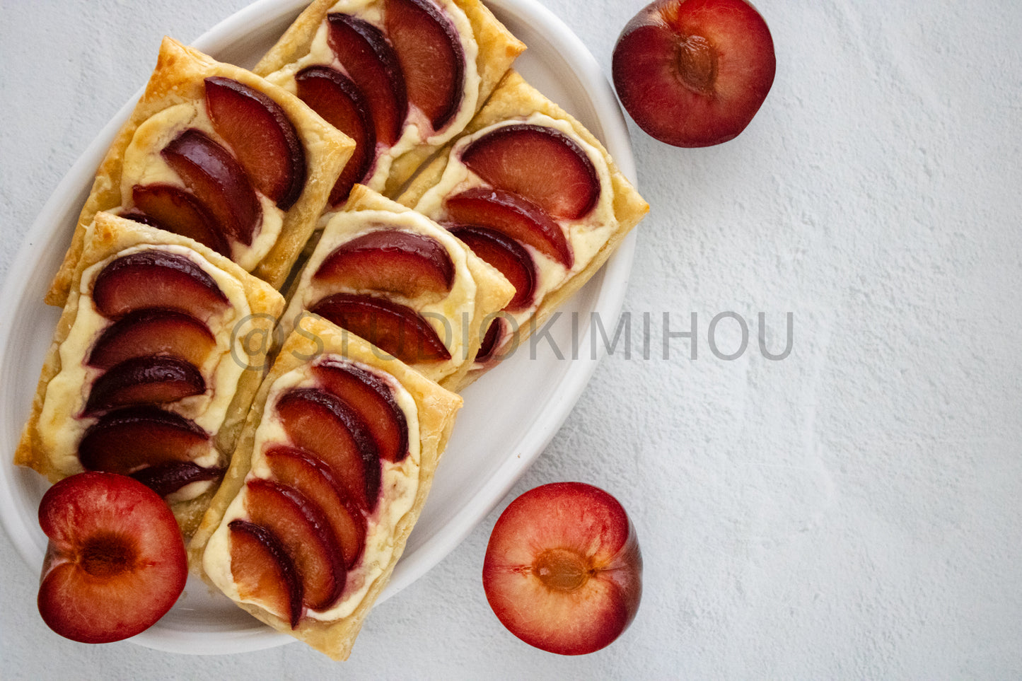 Semi-Exclusive Plum Puff Pastry Tart on Linen