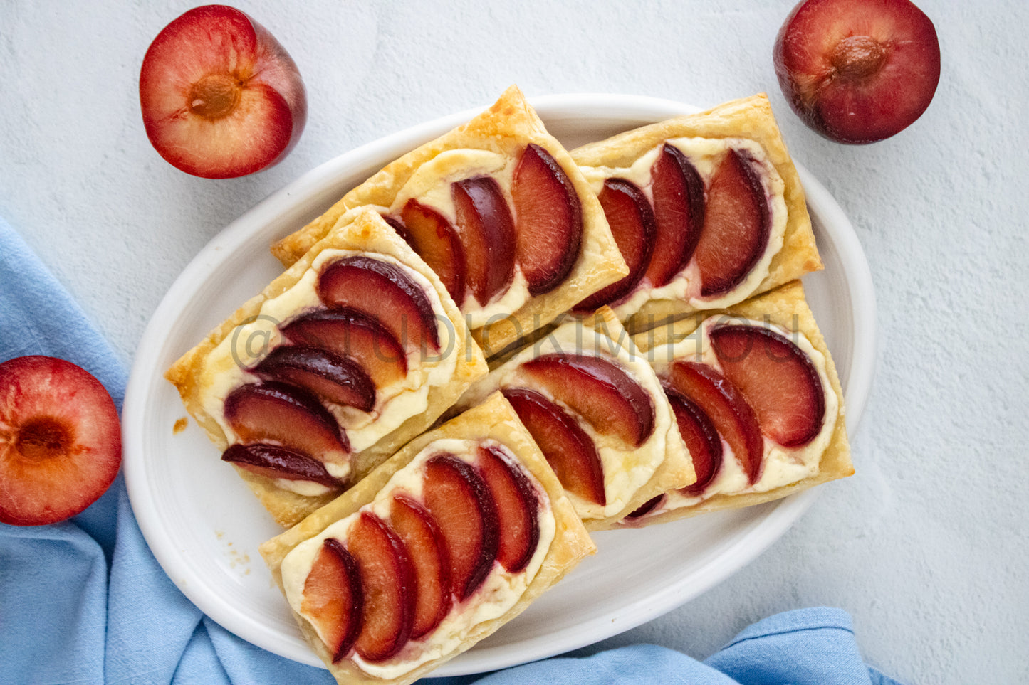 Semi-Exclusive Plum Puff Pastry Tart on Linen