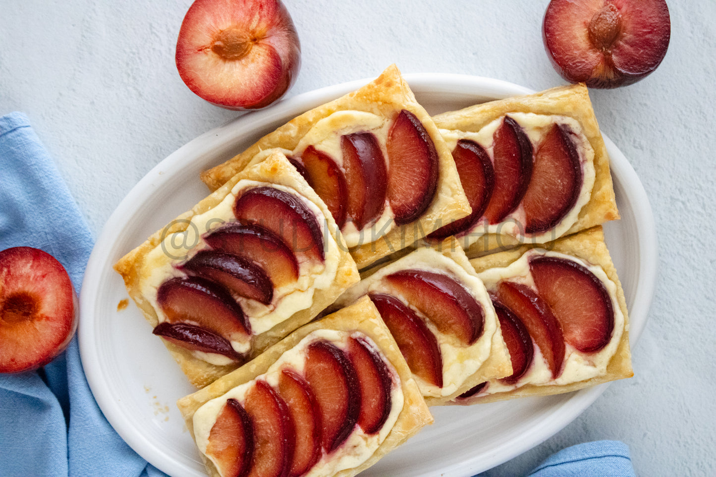Semi-Exclusive Plum Puff Pastry Tart on Linen