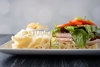 Semi-Exclusive Focaccia Sandwich Bread on Weathered Wood