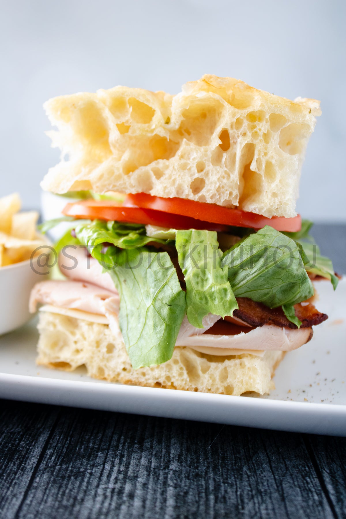 Semi-Exclusive Focaccia Sandwich Bread on Weathered Wood