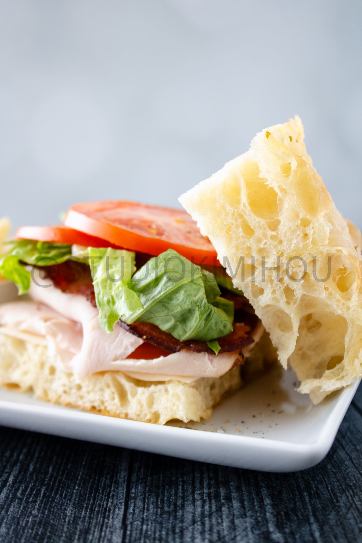 Semi-Exclusive Focaccia Sandwich Bread on Weathered Wood