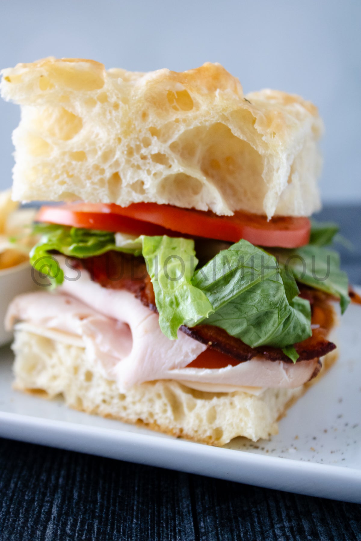 Semi-Exclusive Focaccia Sandwich Bread on Weathered Wood