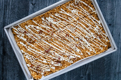 Semi-Exclusive Sweet Potato Rice Krispy Treats on Weathered Wood