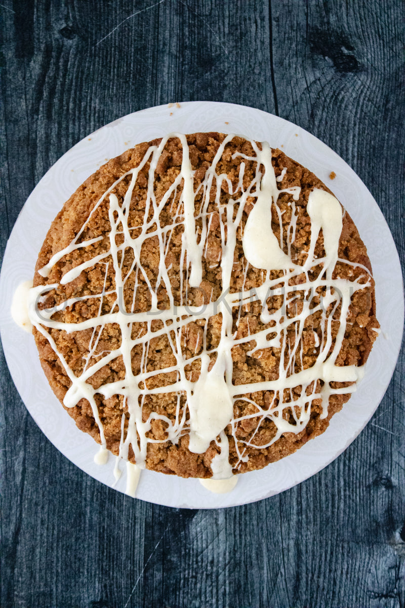 Semi-Exclusive Eggnog Coffee Cake on Weathered Wood