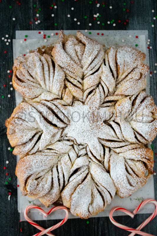 Semi-Exclusive Cinnamon Roll Snowflake on Weathered Wood