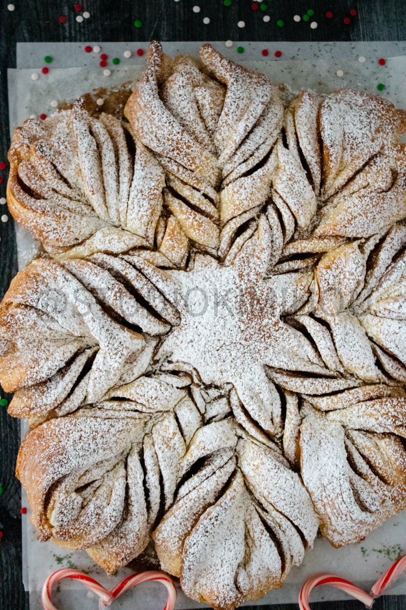 Semi-Exclusive Cinnamon Roll Snowflake on Weathered Wood