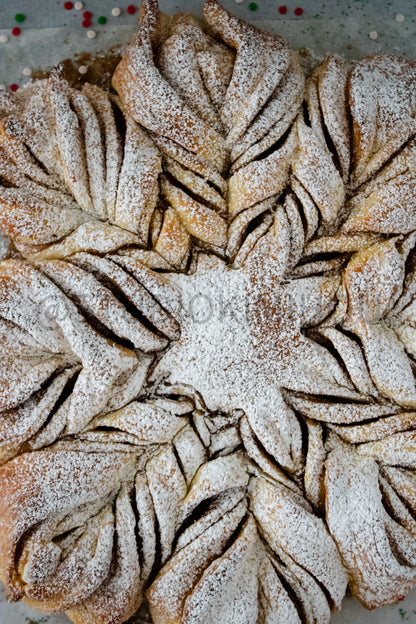 Semi-Exclusive Cinnamon Roll Snowflake on Weathered Wood