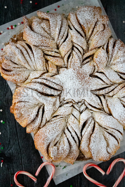 Semi-Exclusive Cinnamon Roll Snowflake on Weathered Wood