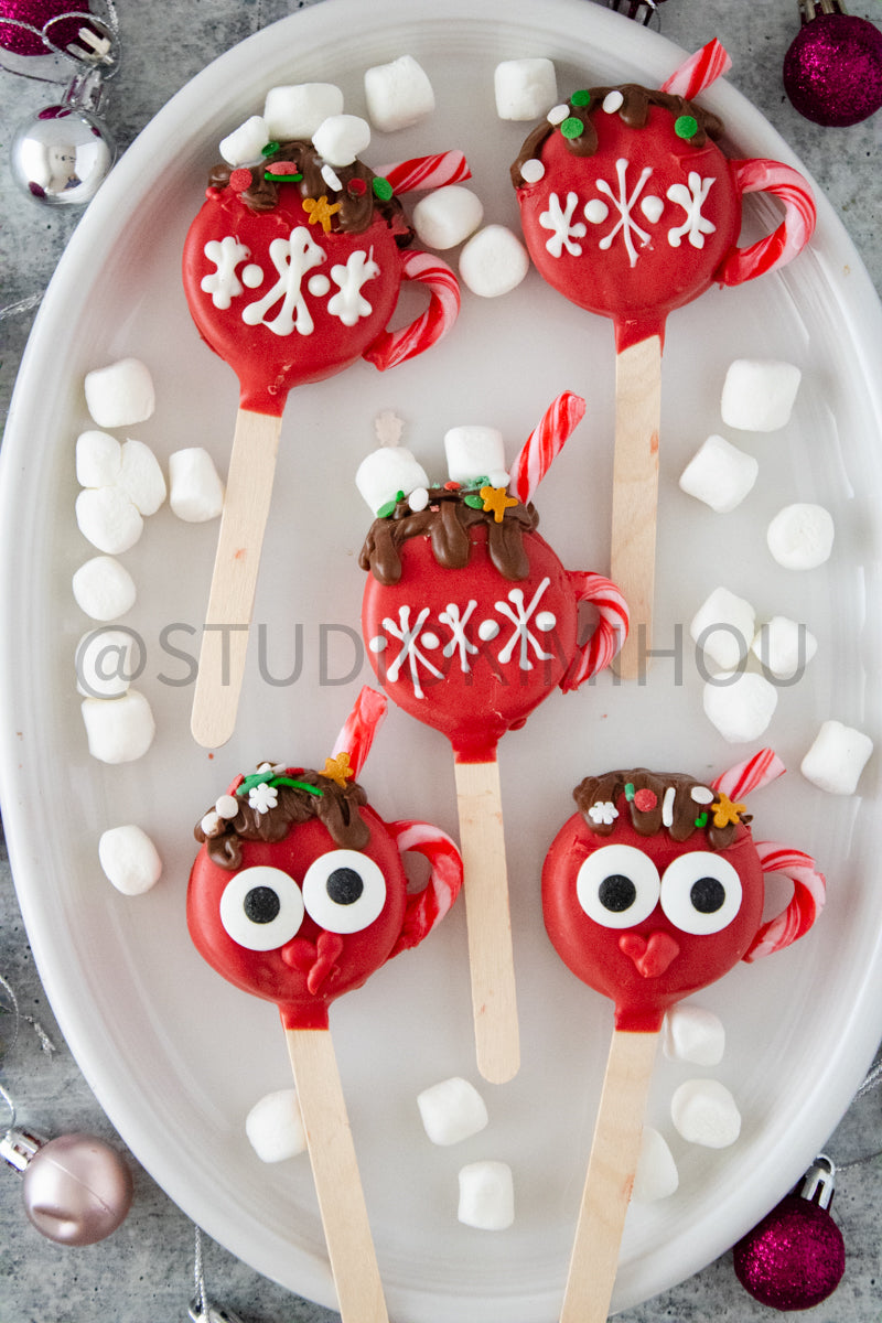 Semi-Exclusive Hot Cocoa Oreo Pop on Concrete