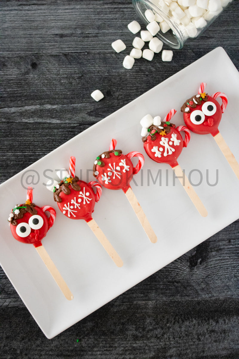 Semi-Exclusive Hot Cocoa Oreo Pop on Weathered Wood