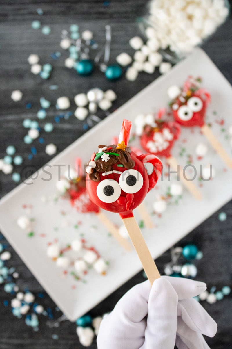 Semi-Exclusive Hot Cocoa Oreo Pop on Weathered Wood