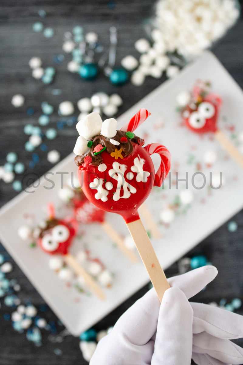 Semi-Exclusive Hot Cocoa Oreo Pop on Weathered Wood