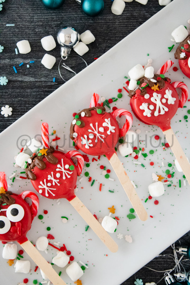 Semi-Exclusive Hot Cocoa Oreo Pop on Weathered Wood
