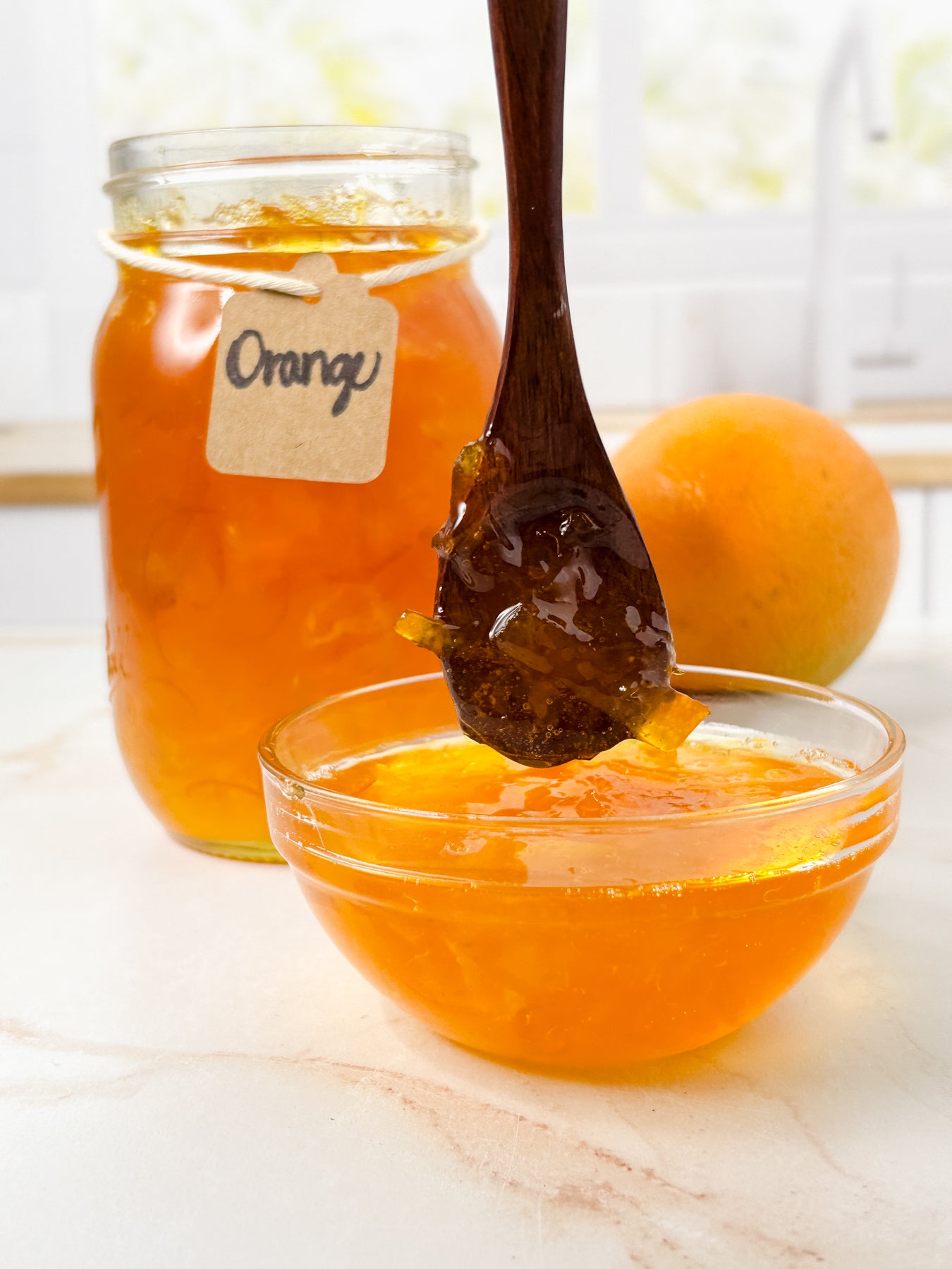 Semi-Exclusive Orange Marmalade on Champagne Marble