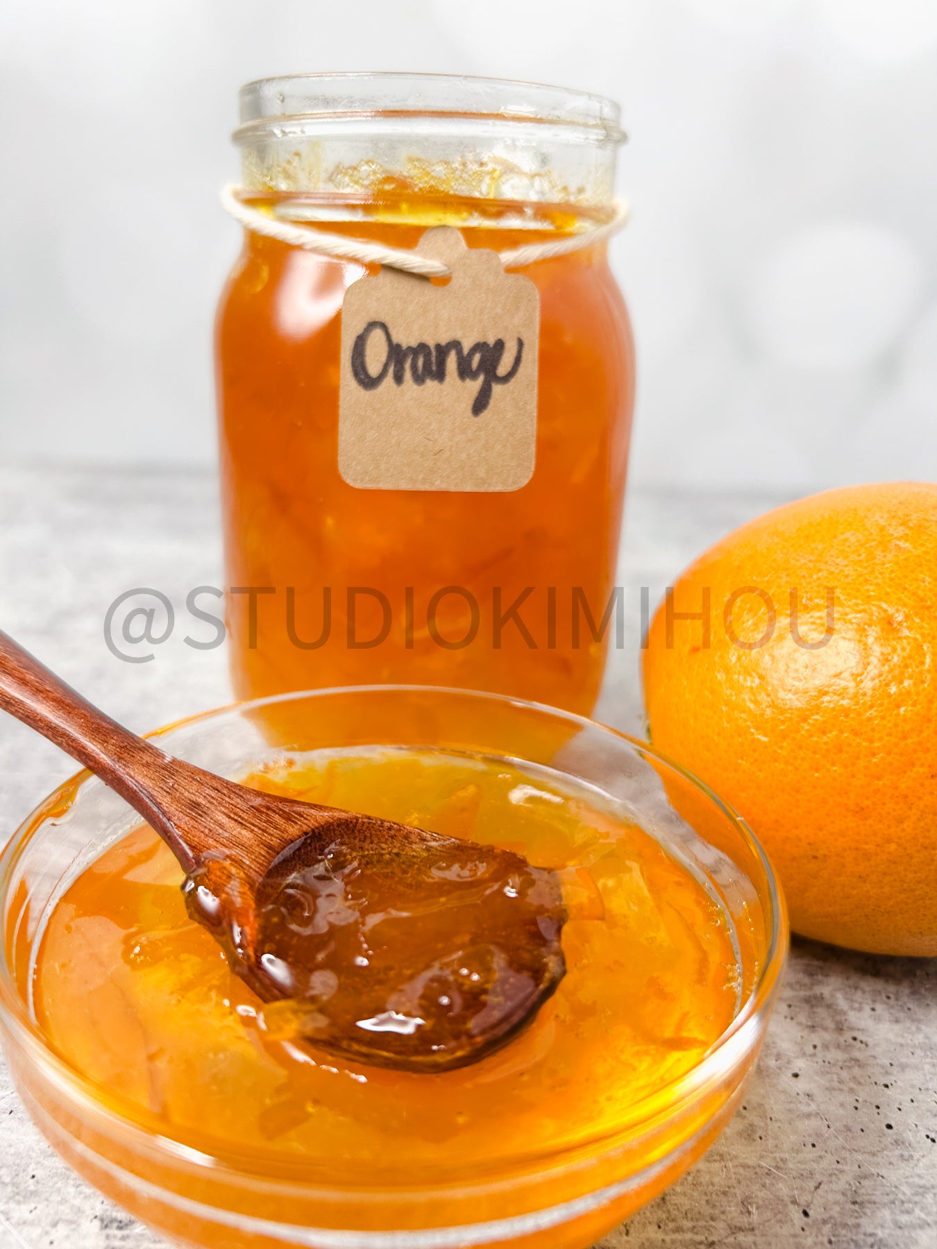 Semi-Exclusive Orange Marmalade on Concrete