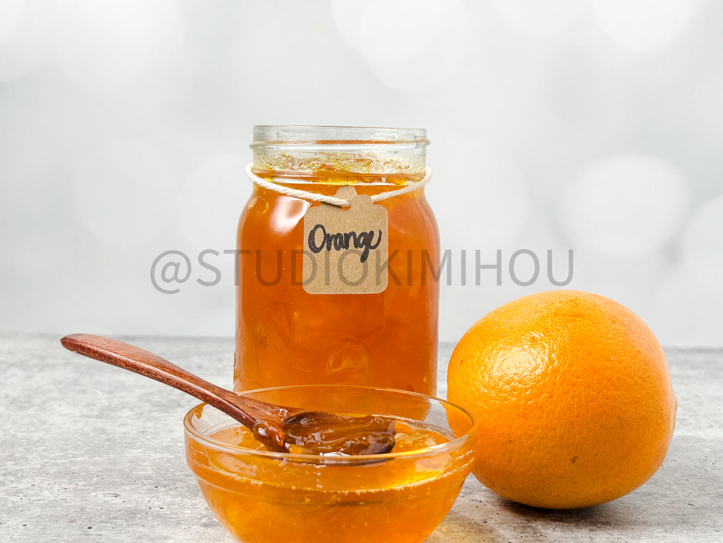 Semi-Exclusive Orange Marmalade on Concrete