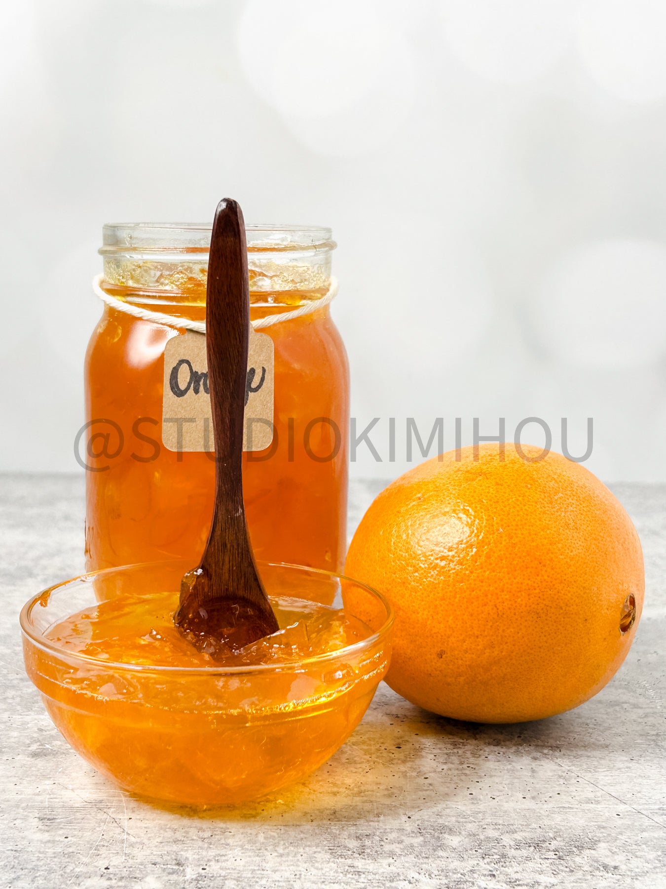 Semi-Exclusive Orange Marmalade on Concrete