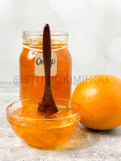 Semi-Exclusive Orange Marmalade on Concrete