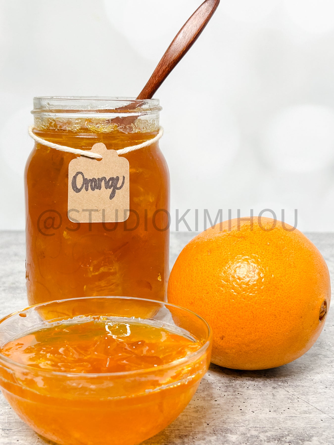 Semi-Exclusive Orange Marmalade on Concrete