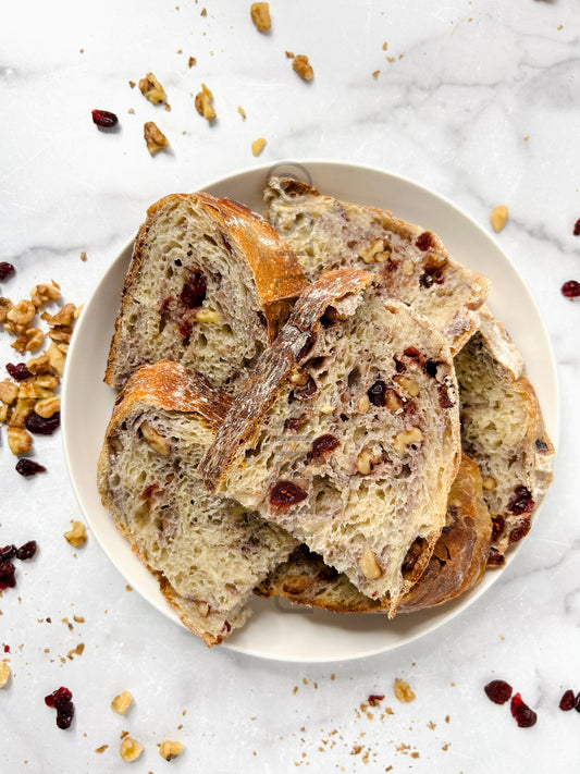 Semi-Exclusive Orange Cranberry Walnut Sourdough on Marble